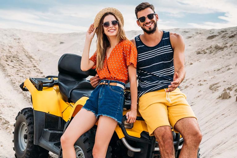 Young Couple Enjoying Quad Bike Ride